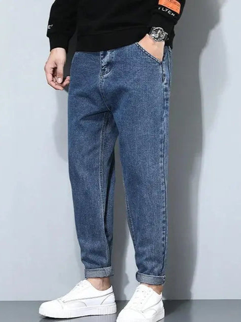 Relaxed Fit Tapered Jeans for Men.